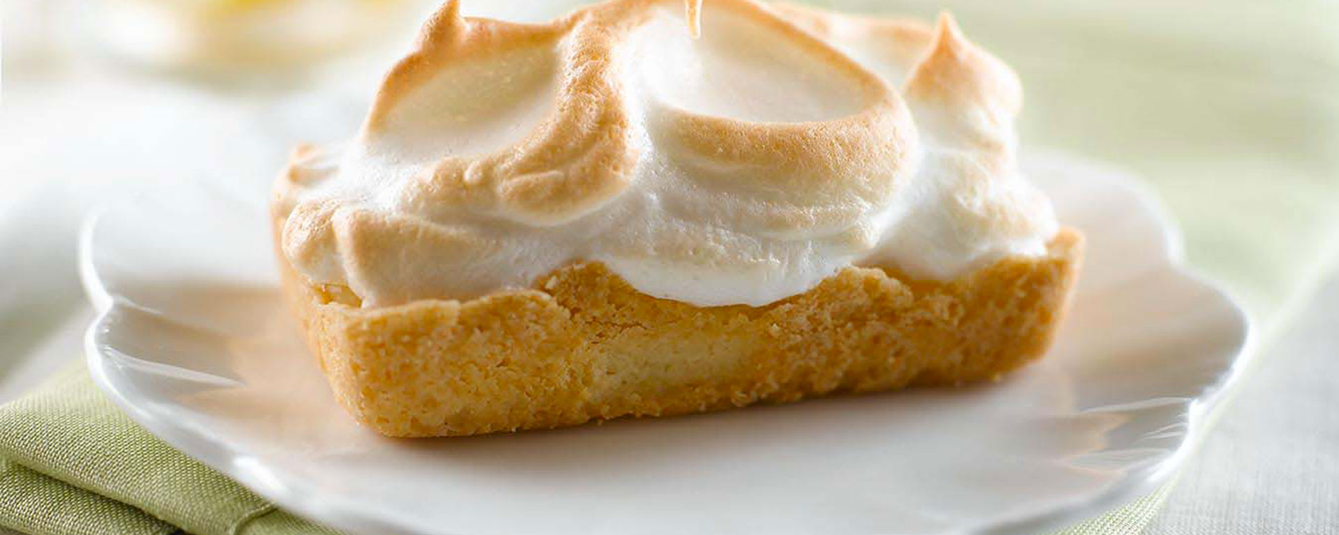 Photo for - Sour Cream Lemon Meringue Shortbread Tarts