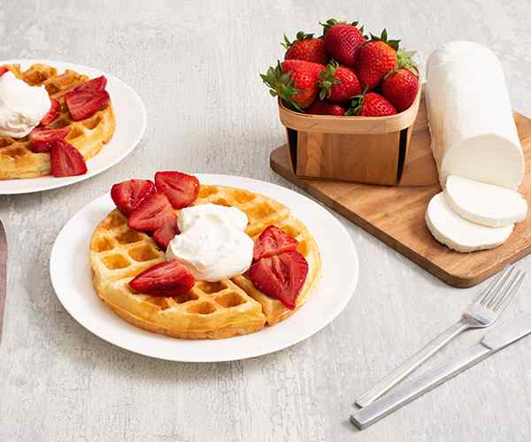 Photo of - Buttermilk Waffles with Balsamic Roasted Strawberries and Goat Cheese Whipped Cream