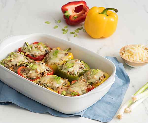 Photo of - Cheesy Quinoa-Stuffed Peppers