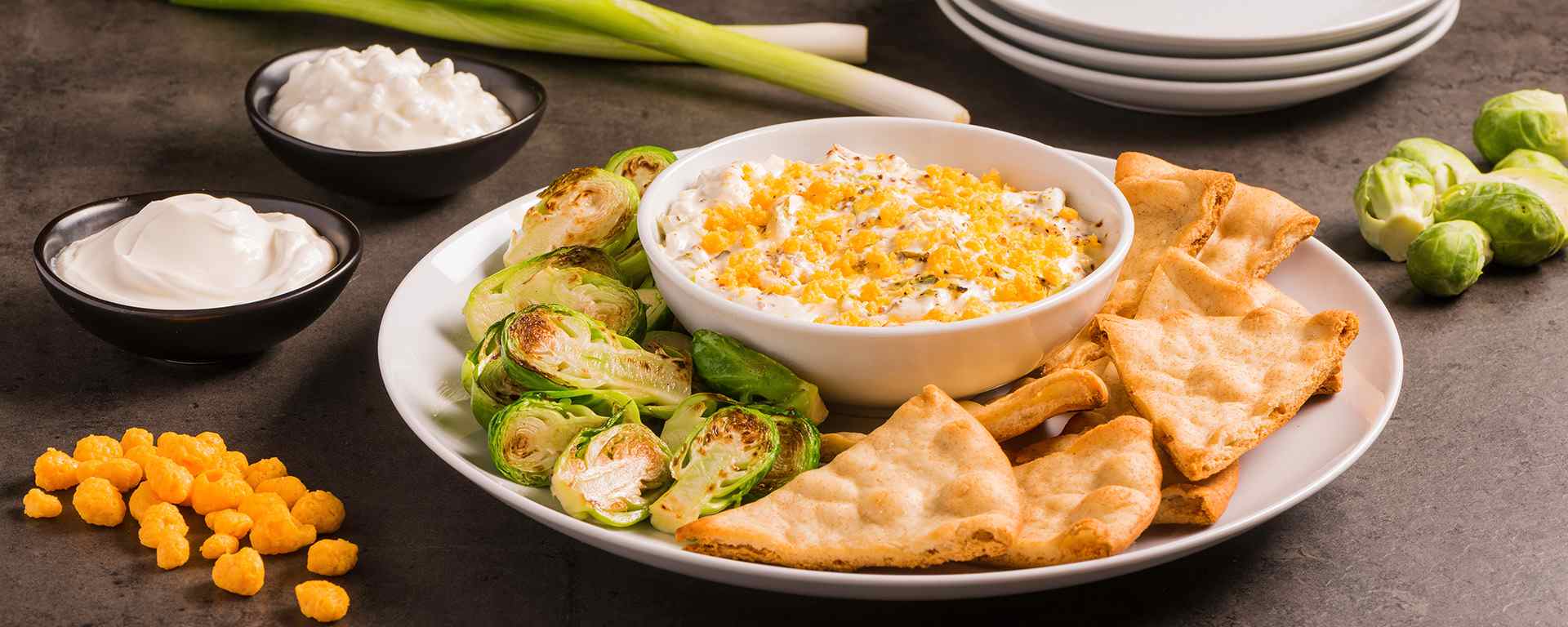 Photo for - Warm Bacon Cheese Dip with Roasted Brussels Sprouts