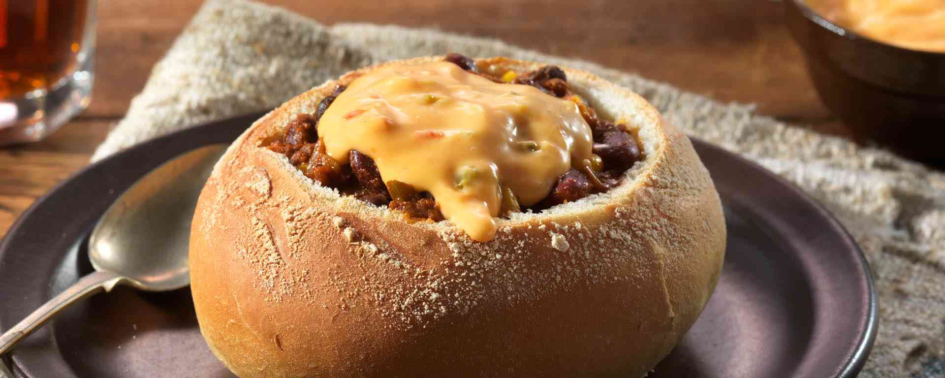 Photo for - Salsa Con Queso Topped Chili in a Bread Bowl